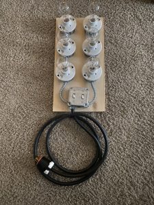 Completed load bank with cord set mounted and light bulbs attached